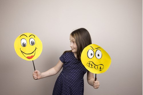 Girl with emoji signs